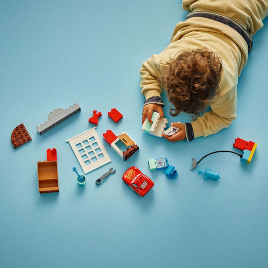LEGO DUPLO Disney and Pixar Cars McQueenβs Visit to Docβs Garage Building Kit For Ages 2+ Years